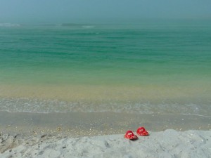 Aqua water with orange shoes