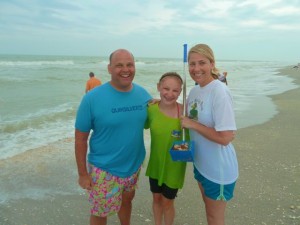 Family Captiva beach with seashells
