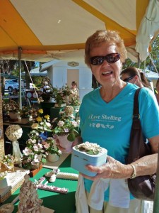 Mom buying a few shell crafts
