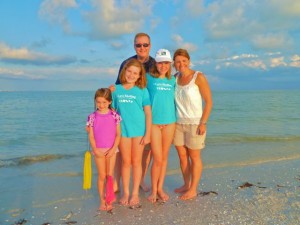 Family on Sanibel lighthouse beach