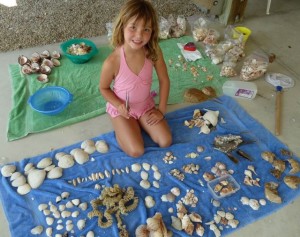Taylor with seashells Taylor with seashells