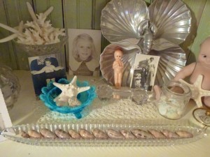 olive dish with seashells