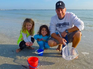 dad with girls on sanibel beach dad with girls on sanibel beach