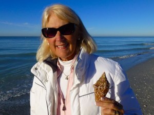 jane with juvenile milk conch sanibel beach jane with juvenile milk conch sanibel beach