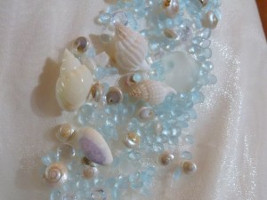 seashells and sea glass embellish dress