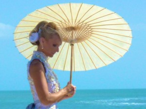 beach bride with umbrella beach bride with umbrella