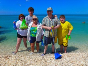 family on beach seashells family on beach seashells