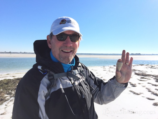 Clark Rambo with Alphabet Cone shell Clearwater Beach Florida