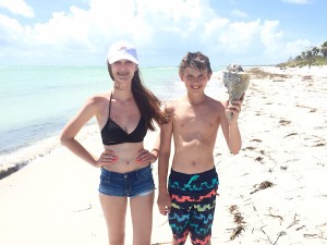 Alex and Jack find shells on Florida beach